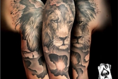 inferno-tattoo-barcelona-realismo-negro-y-gris-christian-kurt-bieber-grande-brazo-retrato-leon-1