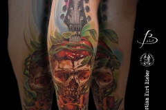 inferno-tattoo-barcelona-christian-kurt-bieber-realismo-grande-pierna-gemelo-calavera-color-brazo