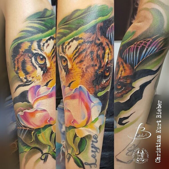 Realismo color, Christian Kurt Bieber. Tatuaje mediano en brazo de leona